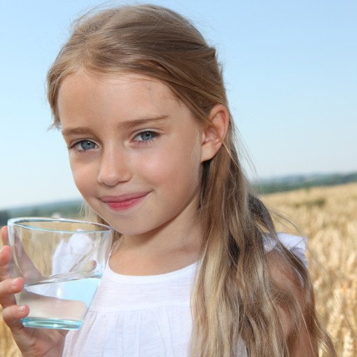 Young Girl Drinking Clean Water